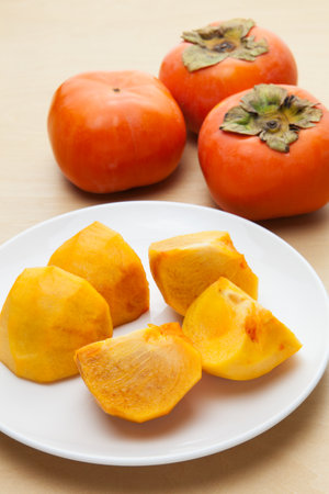 Cut fruit, japanese persimmonsの写真素材