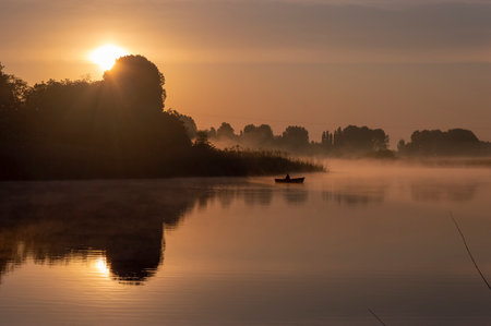Foggy morning on the river at dawn. Landscape.の写真素材