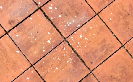 orange tile with color White stainの写真素材