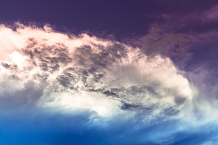 uncommon sky view,fantasy color wave cloud in purple and blue light skyの写真素材