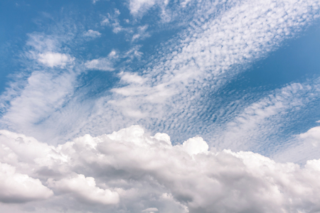 Altocumulus and low clouds,white cloudscape in blue skyの写真素材