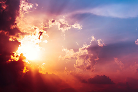 colorful sun ray,orange red violet and blue light from the sun During the end day skyの写真素材