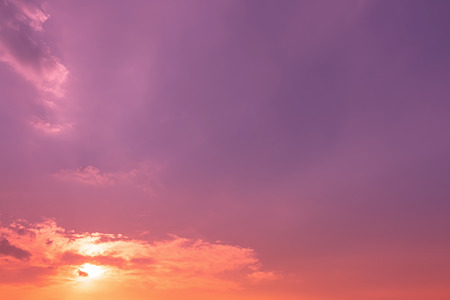 Sundown with purple and orange red light in skyの写真素材