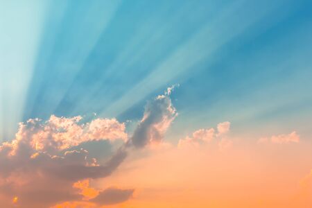 orange sundown light with rim light in blue sky with sun beam light