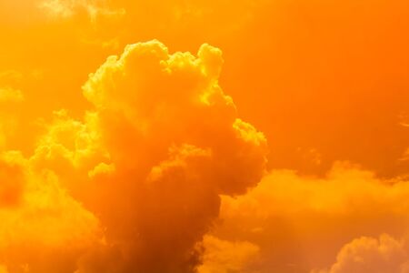 hot orange color sky with clouds