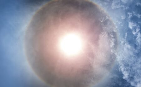 eye of god in dim blue sky,Sun Halo