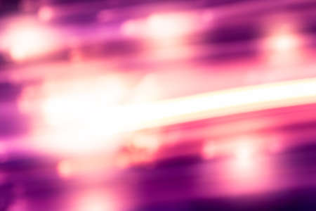 blurry bright line light and orange with purple pink color,abstract blurry light backgroundの写真素材