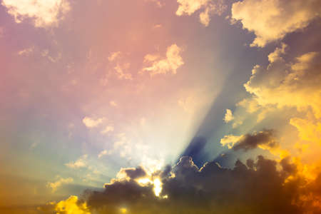 colorful sun beam light with dim clouds