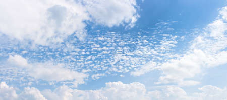 Bright sun light with white cloudy in light blue sky
