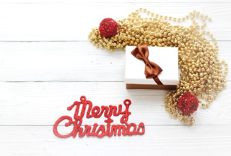 holiday decorations, gift box, beads and inscription