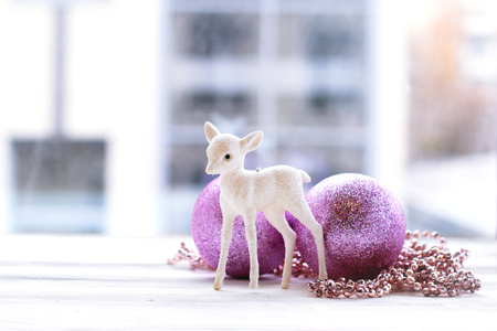 Christmas decoration, artificial flower and balls and figurineの写真素材