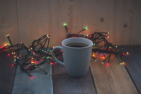 A blue cup of coffee on the tableの写真素材