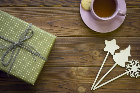 Still life with a tea cup, wooden toys and gift boxの写真素材