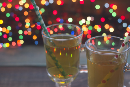 Two cups of tea with fairy lightsの写真素材