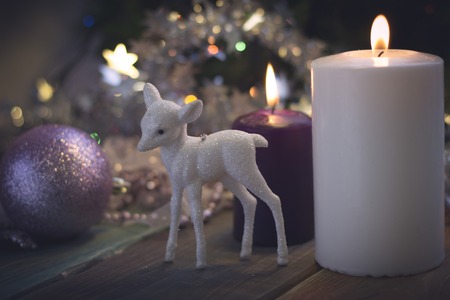 Still life with candles and Christmas tree ballsの写真素材