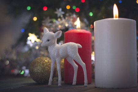 Still life with candles and Christmas tree ballsの写真素材