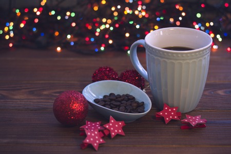 Christmas still life with coffee and ornamentsの写真素材