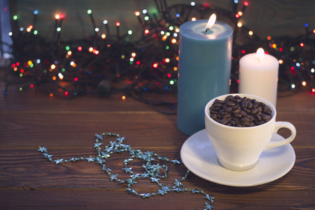 a coffee cup and candlesの写真素材