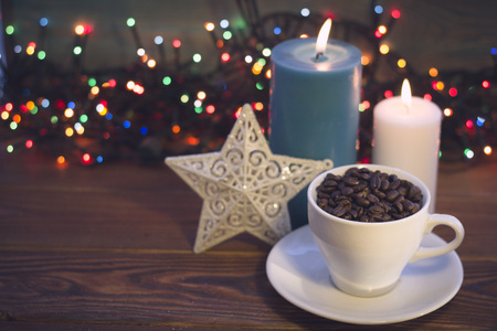 a coffee cup and candlesの写真素材