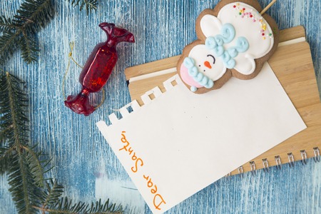 A blue wooden Christmas background with decorationsの写真素材