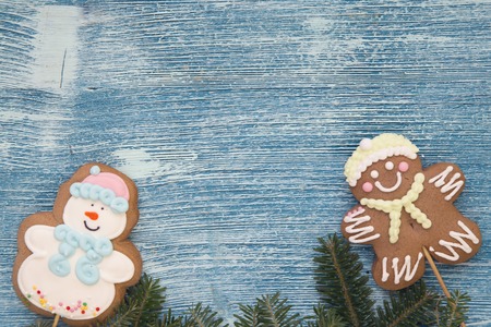 A blue wooden Christmas background with decorationsの写真素材