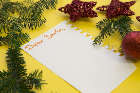 Christmas decorations on a yellow backgroundの写真素材