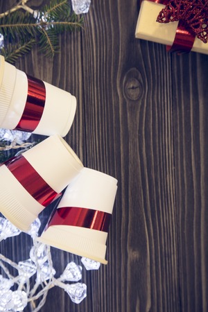 A dark wooden Christmas background with decorationsの写真素材