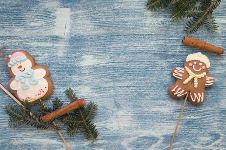 A blue wooden Christmas background with decorationsの写真素材