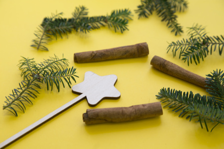 Christmas decorations on a yellow backgroundの写真素材