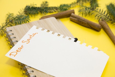 Christmas decorations on a yellow backgroundの写真素材