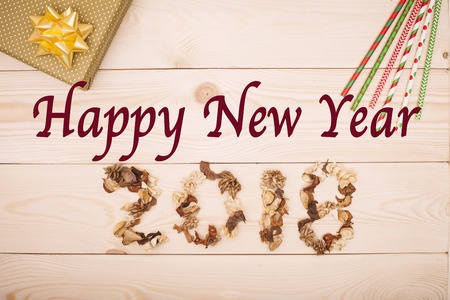 Happy New Year 2018 inscription of dried flowers