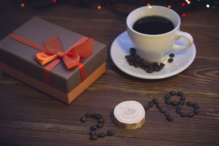 Still life with a coffee cup and a gift boxの写真素材