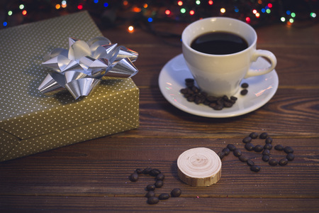 Still life with a coffee cup and a gift boxの写真素材