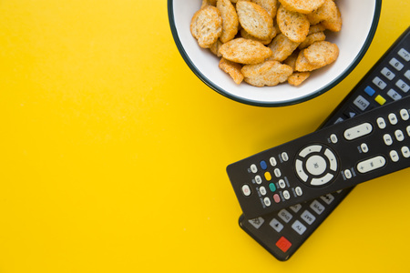 Entertaining at home. Weekend, hobby and leisure concept. A bowl of fresh salty croutons and two...