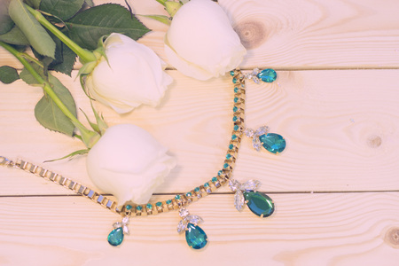 White roses on natural wooden backgroundの写真素材