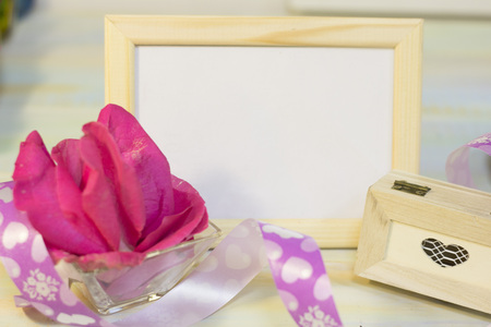 The concept of holidays with a photo frameの写真素材