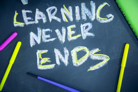 Education concept on a black chalkboardの写真素材