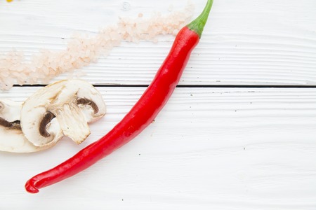 Preparing Healthy Food, Vegeterian, Vegan Concept. White wooden background with red peper and...