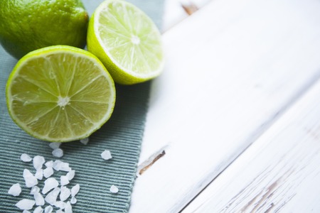 Fresh citrus on a white wooden backgroundの写真素材