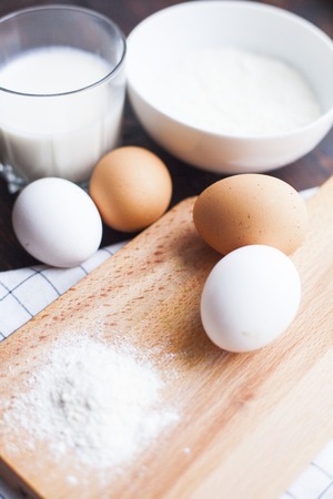 Cooking with milk and eggsの写真素材