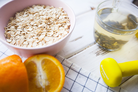 Healthy breakfast on white wooden background