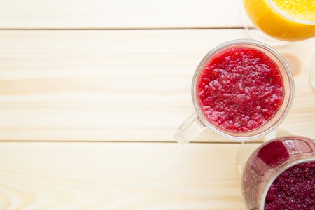 Smoothie on light wooden backgroundの写真素材