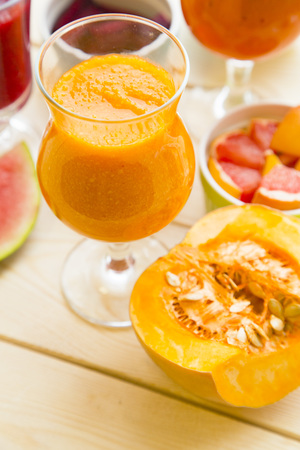 Smoothie on light wooden backgroundの写真素材