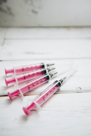 White background with syringesの写真素材