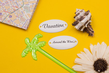 Vacation concept yellow backgroundの写真素材