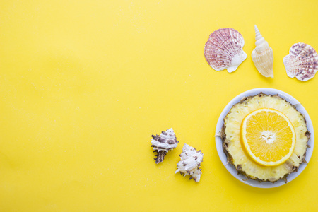 Yellow background with travelling itemsの写真素材