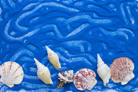 Inscription on a colorful sandの写真素材