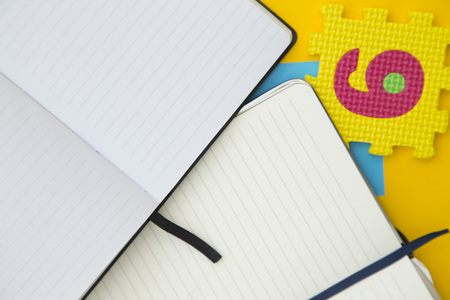 education concept on yellow backgroundの写真素材
