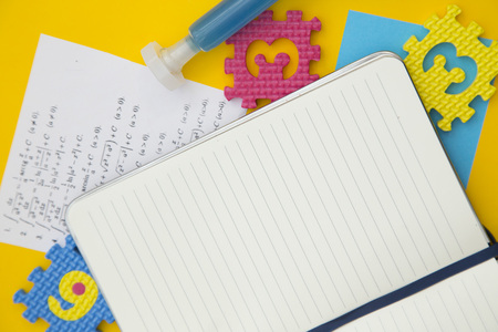education concept on yellow backgroundの写真素材