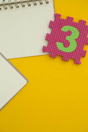 education concept on yellow backgroundの写真素材